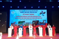 Lễ công bố ứng dụng Du lịch Bình Dương. (Ảnh: Huyền Trang/TTXVN)
