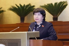 Chủ nhiệm Ủy ban Xã hội của Quốc hội Nguyễn Thúy Anh trình bày Báo cáo về dự kiến tiếp thu, giải trình, chỉnh lý dự thảo Luật Thi đua, khen thưởng (sửa đổi). (Ảnh: Doãn Tấn/TTXVN)