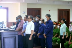 Các bị cáo nghe tuyên án. (Ảnh: Thành Chung/TTXVN)