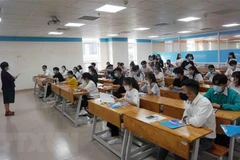 Các thí sinh dự Kỳ thi đánh giá năng lực Đại học quốc gia Thành phố Hồ Chí Minh năm 2021. (Ảnh: Thu Hoài/TTXVN)