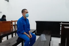 Bị cáo Huy tại phiên tòa. (Nguồn: cand.com.vn)