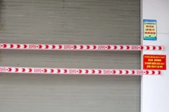 Một gia đình có người mắc COVID-19 được điều trị, cách ly tại nhà trên địa bàn thành phố Thanh Hóa. (Ảnh: Nguyễn Nam/TTXVN)