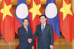 Chủ tịch Quốc hội tiếp Thường trực Ban Bí thư Lào Bounthong Chitmany