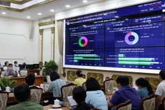 Hệ thống tổng hợp thông tin kinh tế xã hội được trình diễn dưới dạng đồ thị, biểu đồ, hình ảnh minh họa infographic. (Ảnh: Tiến Lực/TTXVN)