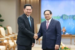 Thủ tướng Phạm Minh Chính tiếp Bộ trưởng, Chủ nhiệm Văn phòng Phủ Thủ tướng Lào Alounxai Sounnalath. (Ảnh: Dương Giang/TTXVN)
