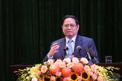 Thủ tướng Phạm Minh Chính phát biểu tại Hội nghị triển khai Nghị quyết số 11-NQ/TW. (Ảnh: Dương Giang/TTXVN)