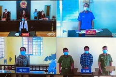 Quang cảnh phiên tòa trực tuyến. (Ảnh: Tuấn Kiệt/TTXVN)