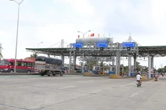 Trạm BOT Cai Lậy. (Ảnh: Nam Thái/TTXVN)