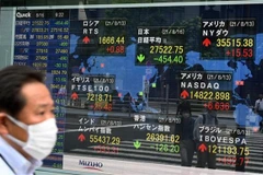 Bảng chỉ số chứng khoán tại Sàn giao dịch chứng khoán Tokyo (Nhật Bản). (Ảnh minh họa. AFP/TTXVN)