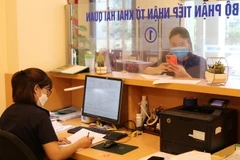 Doanh nghiệp mở tờ khai xuất nhập khẩu hàng hóa tại Chi cục Hải quan Ga Ga đường sắt Quốc tế Đồng Đăng, tỉnh Lạng Sơn. (Ảnh: Quang Duy/TTXVN)