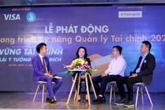Các sinh viên trẻ sẽ có cơ hội được trao đổi trực tiếp kinh nghiệm, kỹ năng từ các nhà chuyên gia tài chính giàu kinh nghiệm. (Ảnh: Minh Hiếu/Vietnam+)
