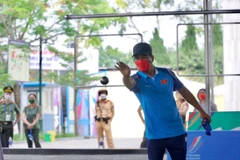 Vận động viên Nguyễn Văn Dũng "đánh rơi" huy chương vàng trong trận chung kết "căng não" với người Thái. (Ảnh: Minh Hiếu/Vietnam+)