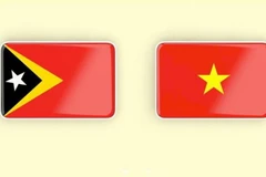 Cờ Việt Nam và Timor-Leste. (Ảnh: TTXVN)
