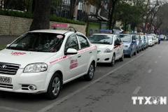 Các lãnh đạo ngành tài chính sẽ phải tự túc kinh phí đi công tác, đi họp thay vì dùng xe biển xanh. (Ảnh: TTXVN)