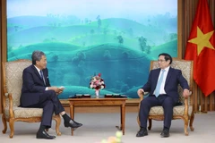 Thủ tướng Phạm Minh Chính tiếp Bộ trưởng Bộ Quốc phòng Malaysia Dato’ Seri Utama Haji Mohamad Bin Haji Hasan. (Ảnh: Dương Giang/TTXVN)