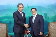 Thủ tướng Phạm Minh Chính tiếp Bộ trưởng Bộ Quốc phòng Malaysia Dato’ Seri Utama Haji Mohamad Bin Haji Hasan. (Ảnh: Dương Giang/TTXVN)