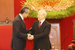 Tổng Bí thư Nguyễn Phú Trọng tiếp Ủy viên Bộ Chính trị, Chủ nhiệm Văn phòng Ủy ban Công tác Đối ngoại Trung ương Đảng Cộng sản Trung Quốc, Bộ trưởng Ngoại giao Trung Quốc Vương Nghị. (Ảnh: Trí Dũng/TTXVN)