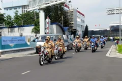 Lực lượng Cảnh sát giao thông và Thanh tra giao thông ra quân tuần tra trên các tuyến đường tại TP. Hồ Chí Minh. (Ảnh: Hoàng Hải/TTXVN)