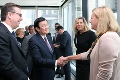 Chủ tịch nước Trương Tấn Sang gặp gỡ đại diện doanh nghiệp Hoa Kỳ dự đối thoại. (Ảnh: Nguyễn Khang/TTXVN)