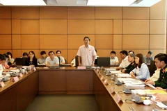 Đại biểu Quốc hội các tỉnh Phú Yên-Đồng Nai-Bắc Giang thảo luận tại tổ. (Ảnh: Phương Hoa/TTXVN)