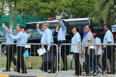 Các thành viên đảng WP tại điểm đăng ký Raffles Institution ngày 19/9. (Ảnh: Mỹ Bình/TTXVN)