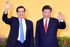 Chủ tịch Trung Quốc Tập Cận Bình (phải) và người đứng đầu chính quyền vùng lãnh thổ Đài Loan Mã Anh Cửu. (Nguồn: AFP/TTXVN)