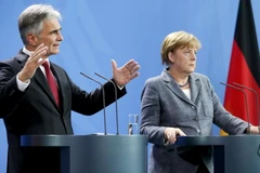 Thủ tướng Áo Werner Faymann và Thủ tướng Đức Angela Merkel. (Nguồn: Reuters)