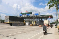 Trạm BOT Cai Lậy chính thức thu phí trở lại từ ngày 25/3. (Ảnh: TTXVN)