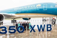Lễ ra mắt máy bay Airbus A350-900 thứ 14 của Vietnam Airlines diễn ra dưới sự chứng kiến của Chủ tịch Quốc hội Việt Nam Nguyễn Thị Kim Ngân và các đại biểu trong Đoàn cấp cao Quốc hội Việt Nam. (Ảnh: Anh Tuấn)
