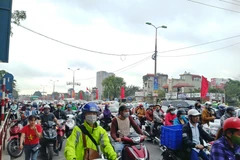 Nhiều tuyến đường thủ đô Hà Nội rơi vào cảnh ùn tắc cục bộ khi người dân trở về sau kỳ nghỉ Tết Nguyên đán. (Ảnh: Việt Hùng/Vietnam+)