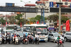 Nhiều tuyến đường thủ đô Hà Nội rơi vào cảnh ùn tắc cục bộ khi người dân trở về sau kỳ nghỉ Tết Nguyên đán. (Ảnh: Việt Hùng/Vietnam+)