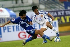 Hà Nội ACB (áo trắng) của "bầu" Kiên đã được hưởng niềm vui chiến thắng. (Nguồn ảnh: thethaovanhoa.vn)