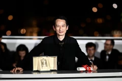 Đạo diễn Trần Anh Hùng. (Ảnh: AFP/TTXVN)
