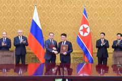 Quang cảnh lễ ký thỏa thuận. (Ảnh: Yonhap)