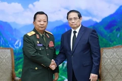 Thủ tướng Phạm Minh Chính tiếp Đại tướng Chansamone Chanyalath, Phó thủ tướng, Bộ trưởng Bộ Quốc phòng Lào sang dự Quốc tang Tổng Bí thư Nguyễn Phú Trọng. (Ảnh: Dương Giang/TTXVN)