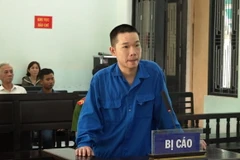 Đối tượng Nguyễn Tấn Sang tại phiên tòa. (Ảnh: TTXVN phát)