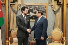 Thủ tướng Phạm Minh Chính gặp Hoàng Thái tử Jordan - Al Hussein Bin Abdullah II. (Ảnh: Dương Giang/TTXVN)