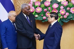 Thủ tướng Phạm Minh Chính tiếp Chủ tịch Quốc hội Cuba Esteban Lazo Hernandez. (Ảnh: Dương Giang/TTXVN)