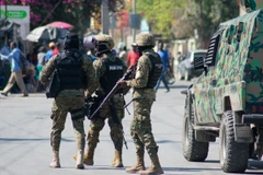 Cảnh sát siết chặt an ninh tại Port-au-Prince, Haiti. (Ảnh: AFP/TTXVN)