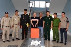 Đối tượng Nguyễn Ánh Dương bị các lực lượng chức năng Việt Nam-Campuchia phối hợp bắt giữ khi đang lẩn trốn tại Campuchia. (Ảnh: TTXVN phát)