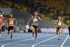 Lê Tú Chinh (số 617) bứt phá về đích đoạt Huy chương Vàng tại Sea Games 29. (Ảnh: Quốc Khánh/TTXVN)