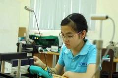 Đinh Thị Hương Thảo với thành tích hai lần đoạt Huy chương Vàng Olympic Vật lý quốc tế năm 2015 và 2016. (Ảnh: Quý Trung/TTXVN)