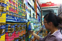 Không ít hãng sữa lớn đã tăng giá ngay từ đầu năm 2014 (Ảnh: Thùy Giang/Vietnam+)