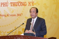 Bộ trưởng, Chủ nhiệm Văn phòng Chính phủ Mai Tiến Dũng chủ trì cuộc họp báo. (Ảnh: Phạm Kiên/TTXVN)