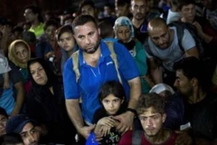 Người di cư đợi nhập cảnh vào Canada. (Nguồn: theglobeandmail.com)