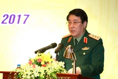 Thượng tướng Lương Cường phát biểu tại buổi gặp mặt. (Ảnh: An Đăng/TTXVN)