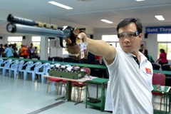 Xạ thủ Hoàng Xuân Vinh. (Ảnh: Thanh Hà/TTXVN)
