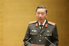 Bộ trưởng Bộ Công an Tô Lâm trình bày Tờ trình về dự án Luật Phòng, chống ma túy (sửa đổi). (Ảnh: Dương Giang/TTXVN)