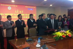 TTXVN và Viện Hàn lâm KHXH Việt Nam ký kết thỏa thuận hợp tác