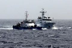 Phóng sự "Rượt đuổi ở Hoàng Sa" trên trang nhất báo Le Monde